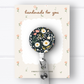 Black Daisy Badge Reel